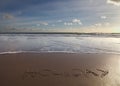 Holiday word written in sand Royalty Free Stock Photo