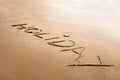 Holiday word written on the sand concept abstract Royalty Free Stock Photo