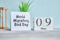 Holiday World Migratory Bird Day - 9 ninth May Month Calendar Concept on Wooden Blocks