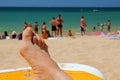 Holidaymaker relaxing on Falesia Beach in Algarve