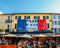 Holidaymakers in Antibes, Cote d`Azur, France sit at a terrace in a restaurant during the summer