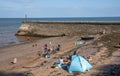 Holidaymakers on the beach in Dawlish, Devon, UK