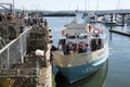 Holidaymakers departing a ferry in Torquay England UK