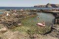 Holidaymakers enjoying the pools at Puerto de las Nieves on Gran Canaria.