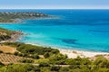 Holidaymakers and turquoise Mediterranean at Bodri beach in Corsica