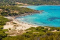 Holidaymakers and turquoise water at Bodri beach in Corsica