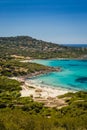 Holidaymakers and turquoise water at Bodri beach in Corsica
