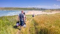 Holidaymakers Walking to the Beach Royalty Free Stock Photo