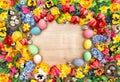 Holidays background with spring flowers and easter eggs. Tulips Royalty Free Stock Photo