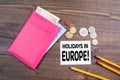 Holidays in Europe. Euro money and British coins with passport Royalty Free Stock Photo