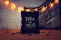 Holidays image of Halloween. photo frame with text over wooden table Royalty Free Stock Photo