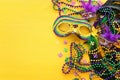 Holidays image of mardi gras masquarade venetian mask over yellow background. view from above Royalty Free Stock Photo