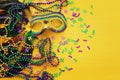 Holidays image of mardi gras masquarade venetian mask over yellow background. view from above Royalty Free Stock Photo