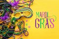 Holidays image of mardi gras masquarade venetian mask over yellow background. view from above Royalty Free Stock Photo