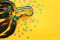 Holidays image of mardi gras masquarade venetian mask over yellow background. view from above Royalty Free Stock Photo