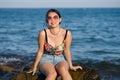 Holidays lifestyle portrait of young Asian woman by the  sea -  happy and beautiful Korean girl  enjoying beach vacation trip Royalty Free Stock Photo