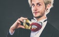 Young man in carnival mask on dark Royalty Free Stock Photo