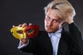 Young man in carnival mask on dark Royalty Free Stock Photo