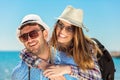 Holidays, vacation, love and friendship concept - smiling couple having fun Royalty Free Stock Photo