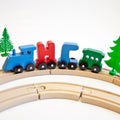 Holidays, winter and celebration concept - Christmas composition Russian wooden letters train cars the word New Year on wood railw