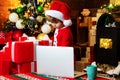Holidays and winter childhood concept. Christmas child dreams. Lovely baby enjoy christmas. Happy new year. Little boy