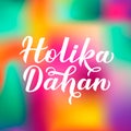 Holika Dahan calligraphy lettering on colorful gradient background. Indian Traditional Holi festival of colors. Hindu celebration Royalty Free Stock Photo