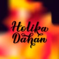 Holika Dahan calligraphy lettering on fire gradient background. Indian Traditional Holi festival of colors. Hindu celebration Royalty Free Stock Photo