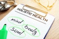 Holistic health and words mind, body and soul. Royalty Free Stock Photo