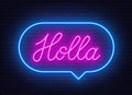 Holla neon sign in the speech bubble on brick wall background. Royalty Free Stock Photo