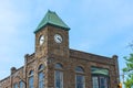 Old Architecture from 1892 of the clock town in central downtown Holland on a sunny summer day