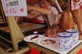 Holland Netherlands Alkmaar Dutch Lady Traditional Costume Dress Cheese Market Sweet Snack Poffertjes Mini Pancakes Waagplein