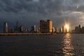 Holland Tunnel Ventilation Shaft and Pier 34 at Hudson River Park in New York City during a Sunset Royalty Free Stock Photo