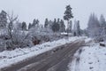 Hollola city buildings along the snow-covered road, Finland. Royalty Free Stock Photo