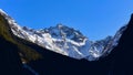 Hollyford Valley lookout offering a scenic view of snow mountains in Fiordland National Park