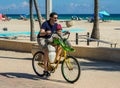 Bicycle rider at the Hollywood Beach Broadwalk in South Florida Royalty Free Stock Photo