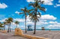 Hollywood Beach with tropical coconut palm trees and boardwalk in Florida. Royalty Free Stock Photo