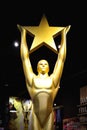 Hollywood, CA/ USA - July 26, 2018: Gold Oscar statue holding gold star