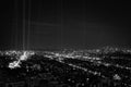 Hollywood and Downtown Los Angeles at night with spot lights