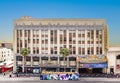 Hollywood and facade of famous cinema el Capitan and Chirardelli disney place by day