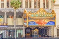 Hollywood and facade of famous cinema el Capitan and Chirardelli disney place by day