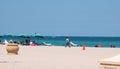 Man using metal detector at beach