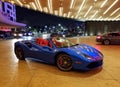 Hollywood, Florida, U.S.A - January 2, 2020 - A blue Ferrari by the entrance of Seminole Hard Rock Cafe and Casino