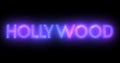 Hollywood neon moving lines text animation on black background.