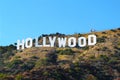 HOLLYWOOD sign on blue sky background. World famous landmark. Royalty Free Stock Photo