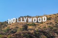 HOLLYWOOD sign on blue sky background. World famous landmark. Los Angeles, California. Royalty Free Stock Photo