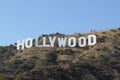 HOLLYWOOD sign on blue sky background. World famous landmark. USA. Los Angeles, Royalty Free Stock Photo