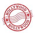 HOLLYWOOD, text written on red postal stamp