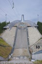 The Holmenkollbakken Ski Museum & Tower is a tourist desitnation were visitors enjoy panoramic views of Oslo at the top of the ski Royalty Free Stock Photo