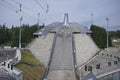 The Holmenkollbakken Ski Museum & Tower is a tourist desitnation were visitors enjoy panoramic views of Oslo at the top of the ski Royalty Free Stock Photo