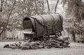 Holocaust memorial in park Babyi Yar, Kiev, sepia. Old wagon with bullet marks in forest. Monument of jews victims in World War 2 Royalty Free Stock Photo